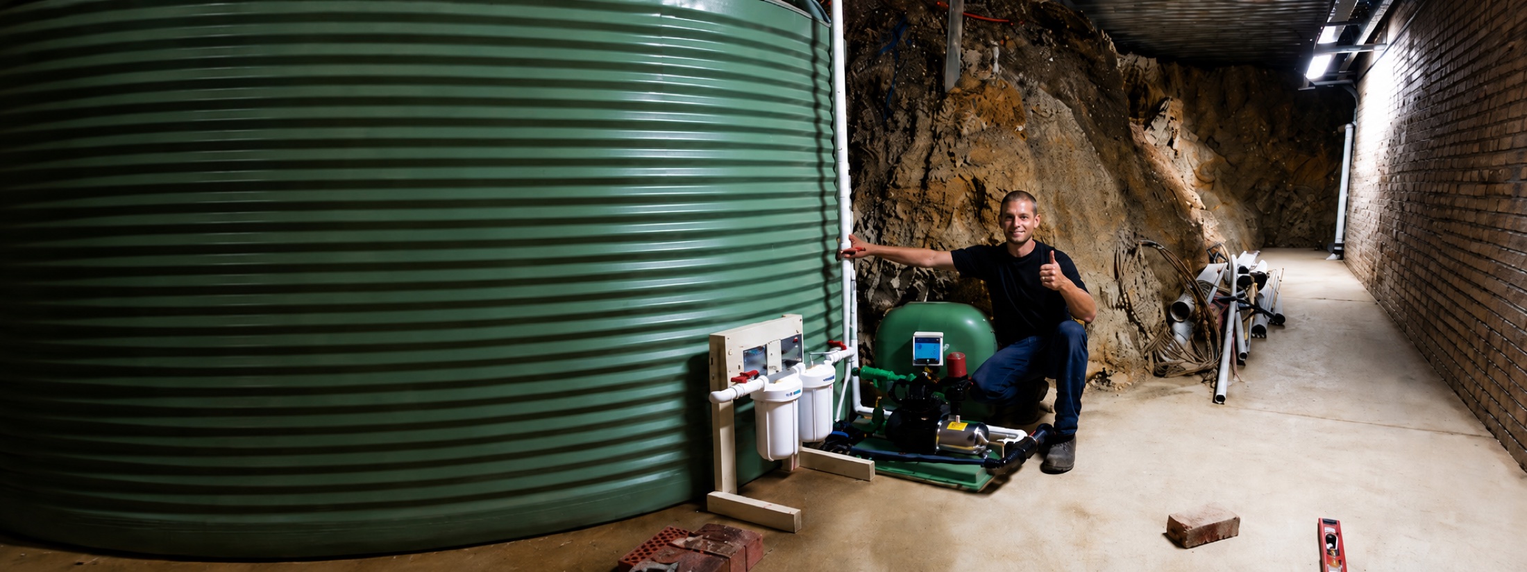Phill from Breeze Plumbing on a rainwater tank and pump installation